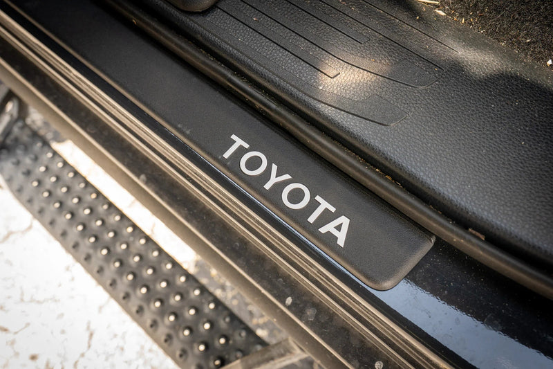 Load image into Gallery viewer, TOYOTA Front Door Sill Letter Overlays - 2024+ Tacoma / 2025+ 4Runner
